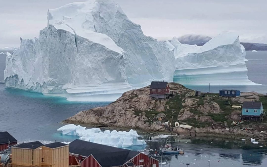 A Giant Iceberg Parked Offshore. It’s Stunning, but Villagers Hit the Road.