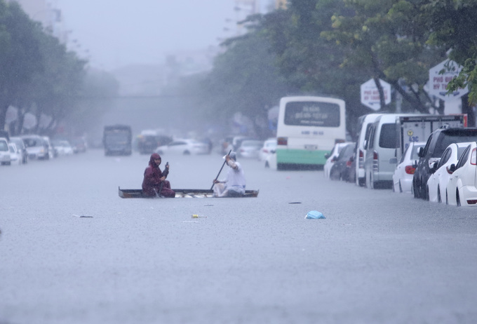 Heavy rains batter Vietnam’s central coast, flood city streets