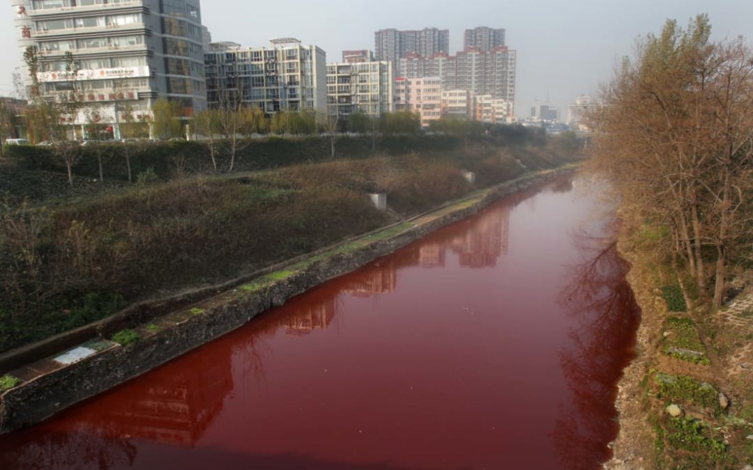 Jian River in Luoyang, China, red from red dye