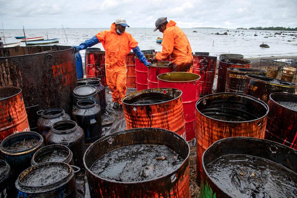 Leaked oil collected in containers