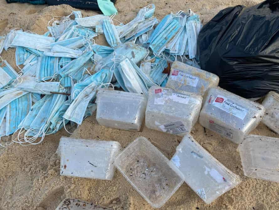 Surgical masks wash up on Sydney beaches after 40 containers fall off cargo ship